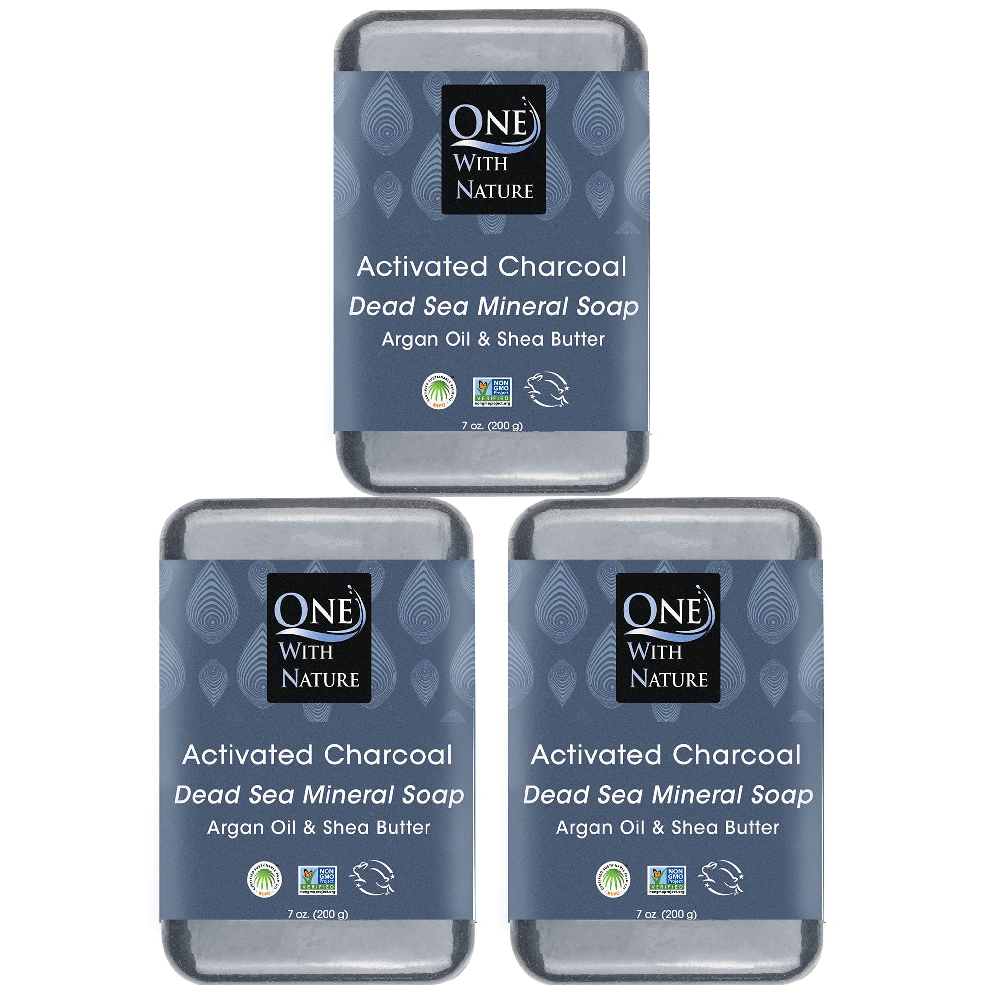 One With Nature activated charcoal soap closeup showing detoxifying charcoal for clearer skin