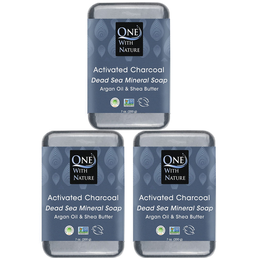 One With Nature activated charcoal soap closeup showing detoxifying charcoal for clearer skin