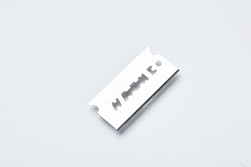 OneBlade Feather FHS-10 blade close-up highlighting PTFE coating for smooth glide
