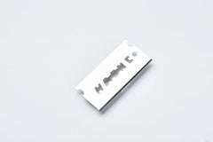 OneBlade Feather FHS-10 blade close-up highlighting PTFE coating for smooth glide