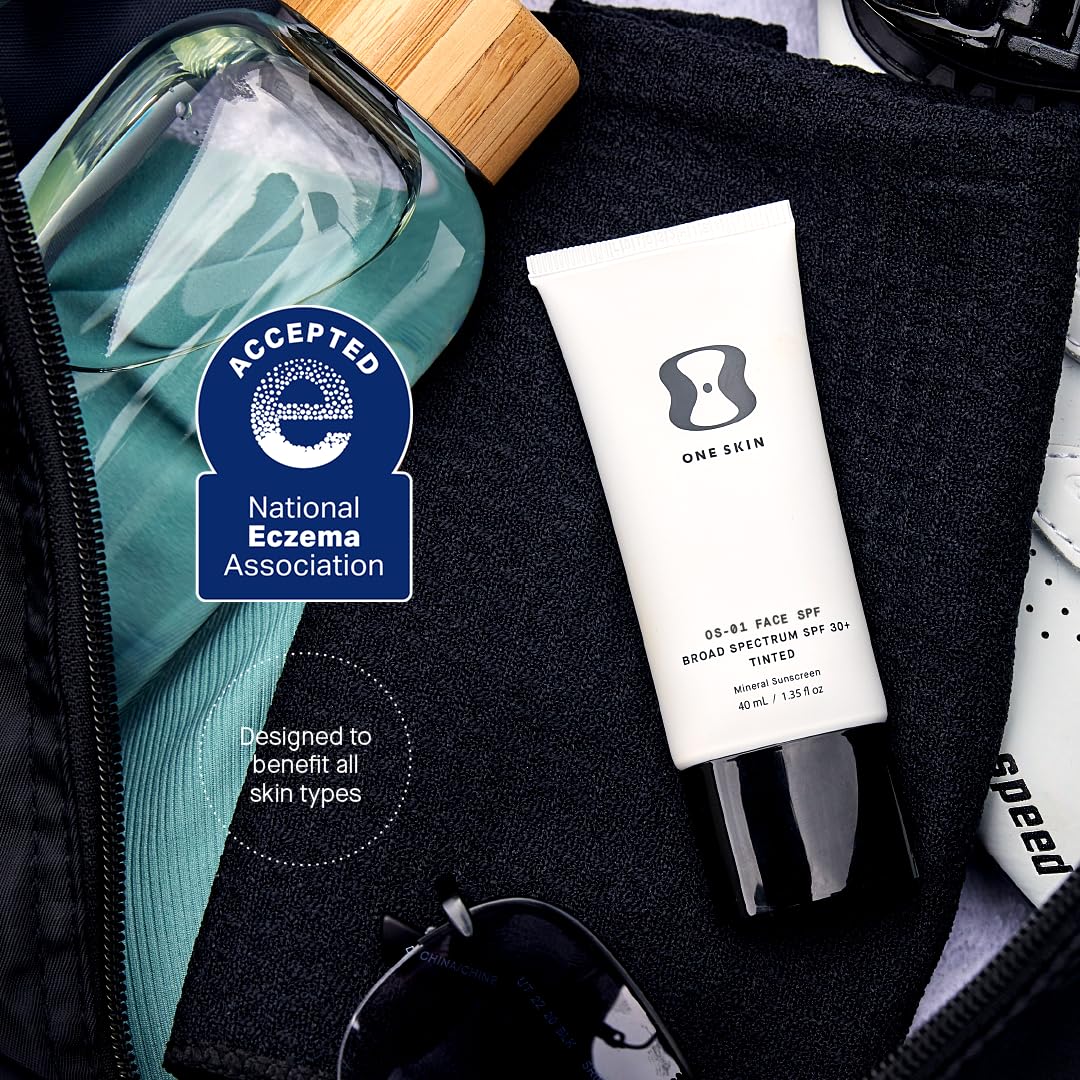 OneSkin OS-01 Shield packaging on a bathroom shelf emphasizes antioxidant-rich ingredients.