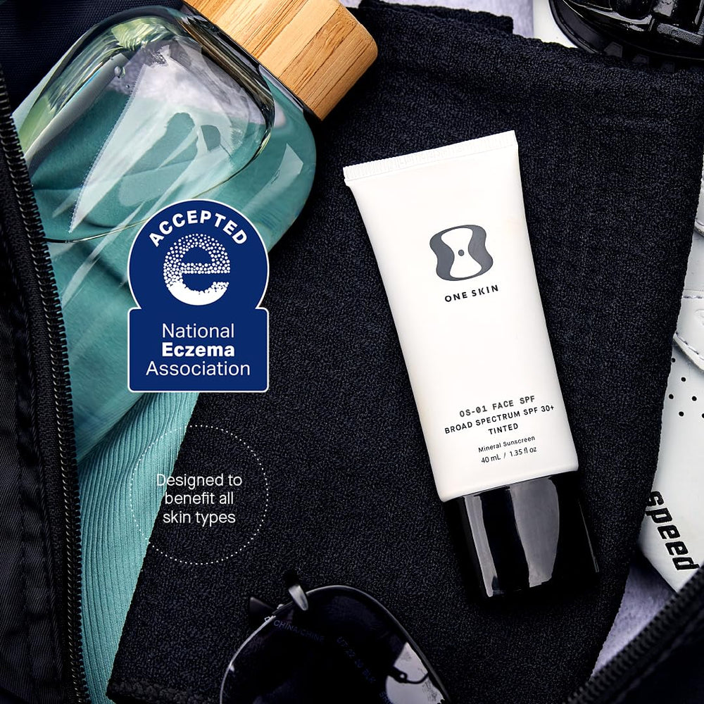OneSkin OS-01 Shield packaging on a bathroom shelf emphasizes antioxidant-rich ingredients.