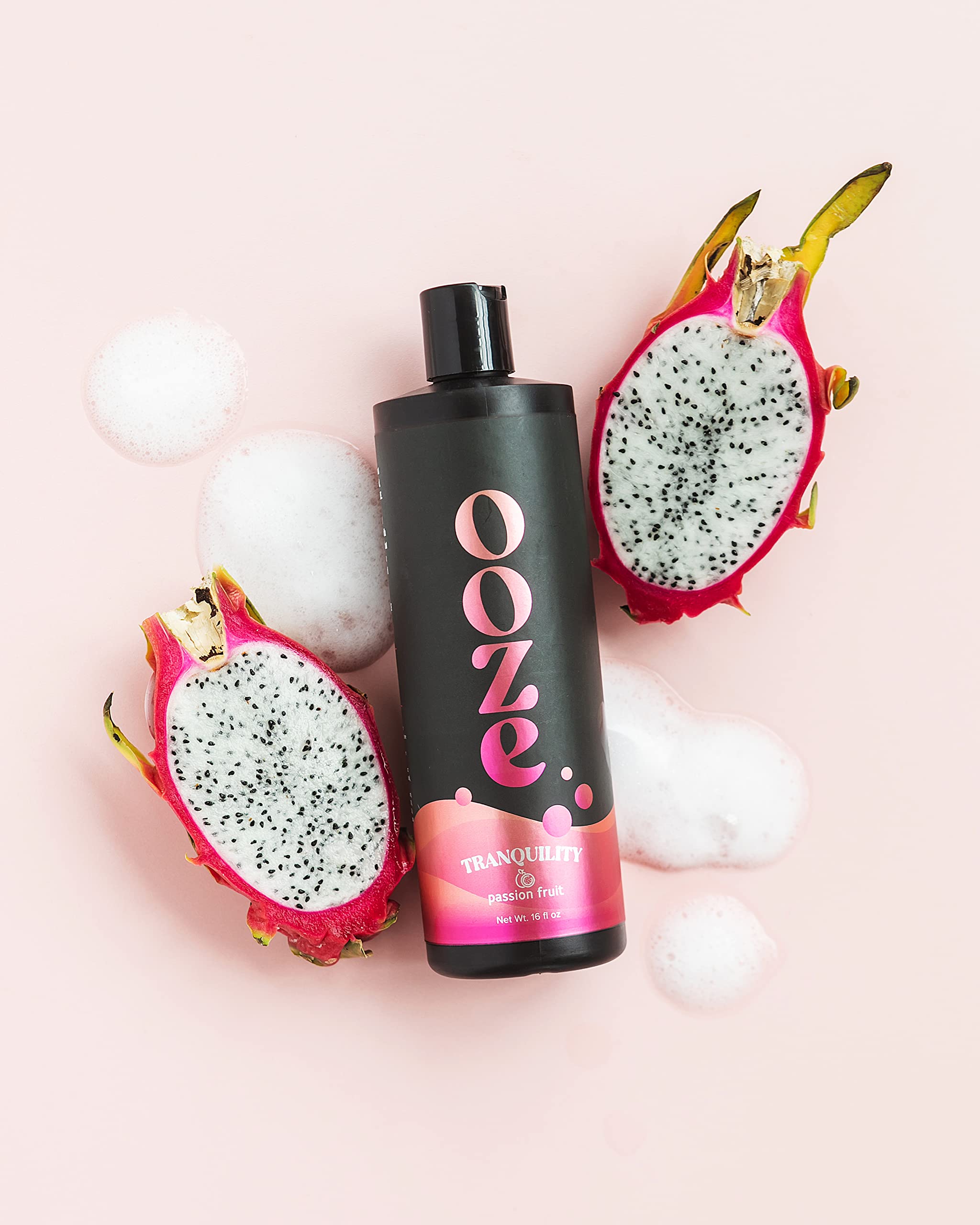 OOZE Passion Fruit Bubble Bath bubbles close-up highlights long-lasting foam for soaking.