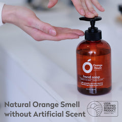 Orange House hand soap foaming lather close-up showing gentle cleansing.