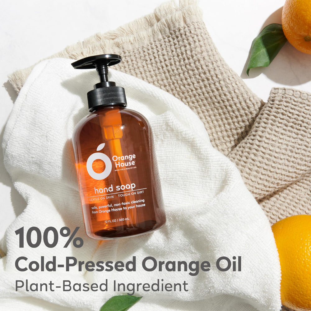 Orange House hand soap in kitchen setting for post-meal cleanup.