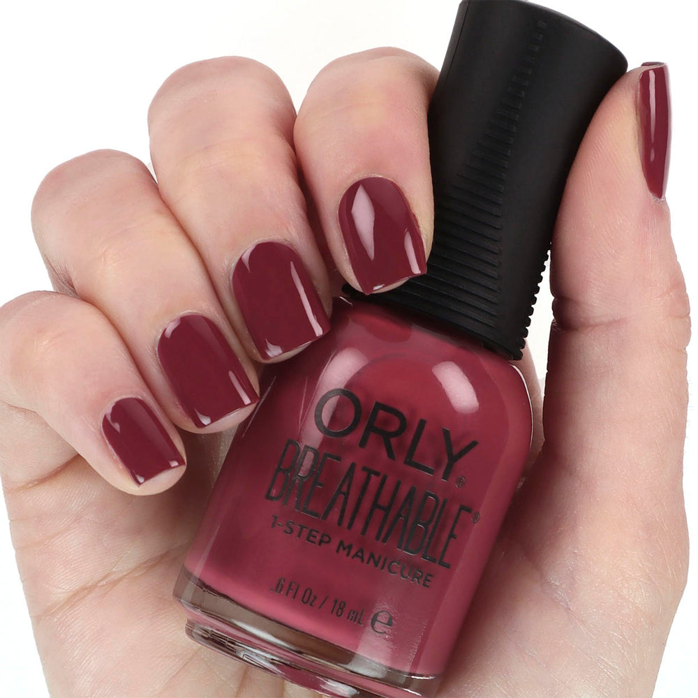 Orly Breathable Loose Threads espresso-tweed bottle for rich color and breathable feel.