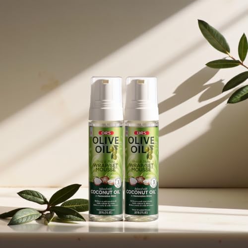 ORS Olive Oil Hold & Shine Mousse closeup label emphasizes olive oil and panthenol in formula.