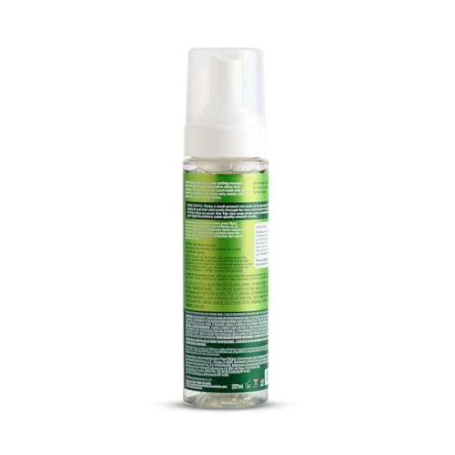 ORS Olive Oil Hold & Shine Mousse soft-hold result shows smooth wrap-and-set finish.