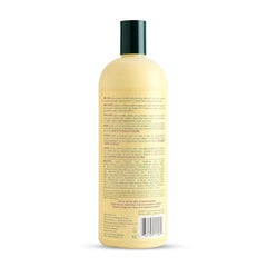 ORS Olive Oil Professional Replenishing Conditioner label closeup highlights rich formula for resilient curls and shine