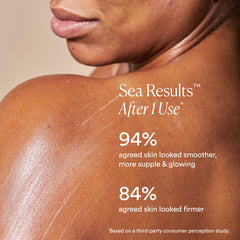 Full bottle view of OSEA anti-aging body balm on a clean surface.