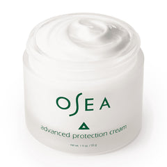 Dab of OSEA Advanced Protection Face Cream on finger demonstrating easy absorption