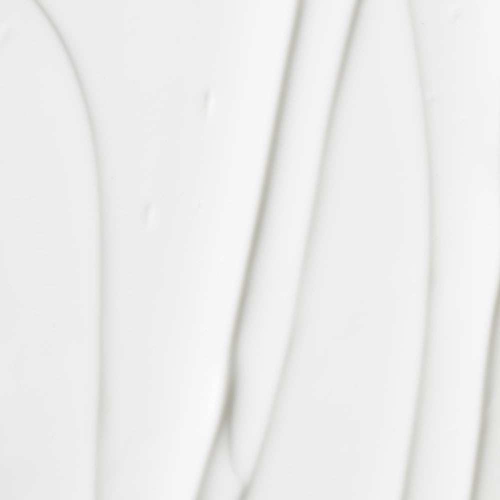OSEA Atmosphere Protection Cream texture swirl highlights fast-absorbing, silky finish.