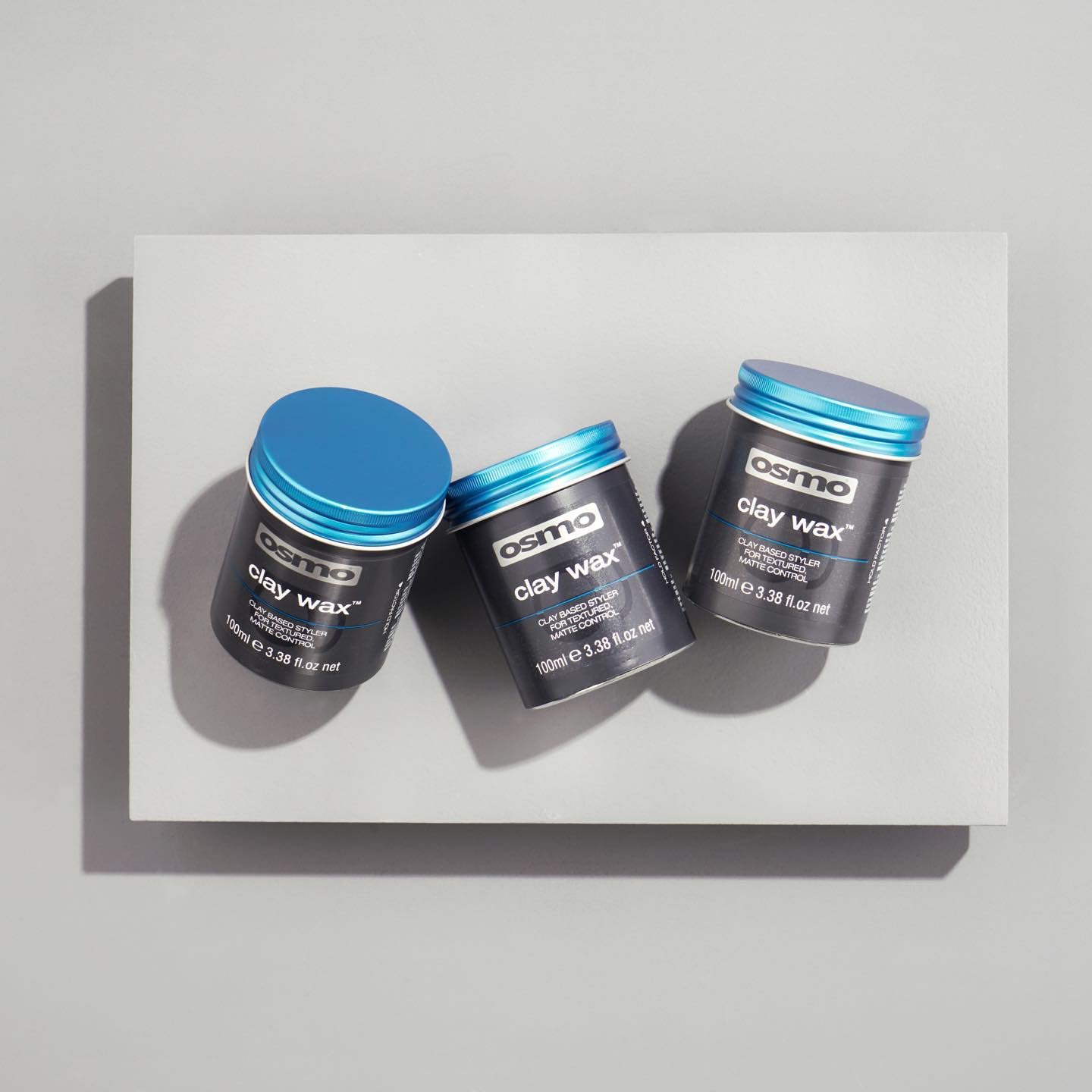 Osmo Firm Hold Clay Wax ingredients closeup shows mineral oil and beeswax