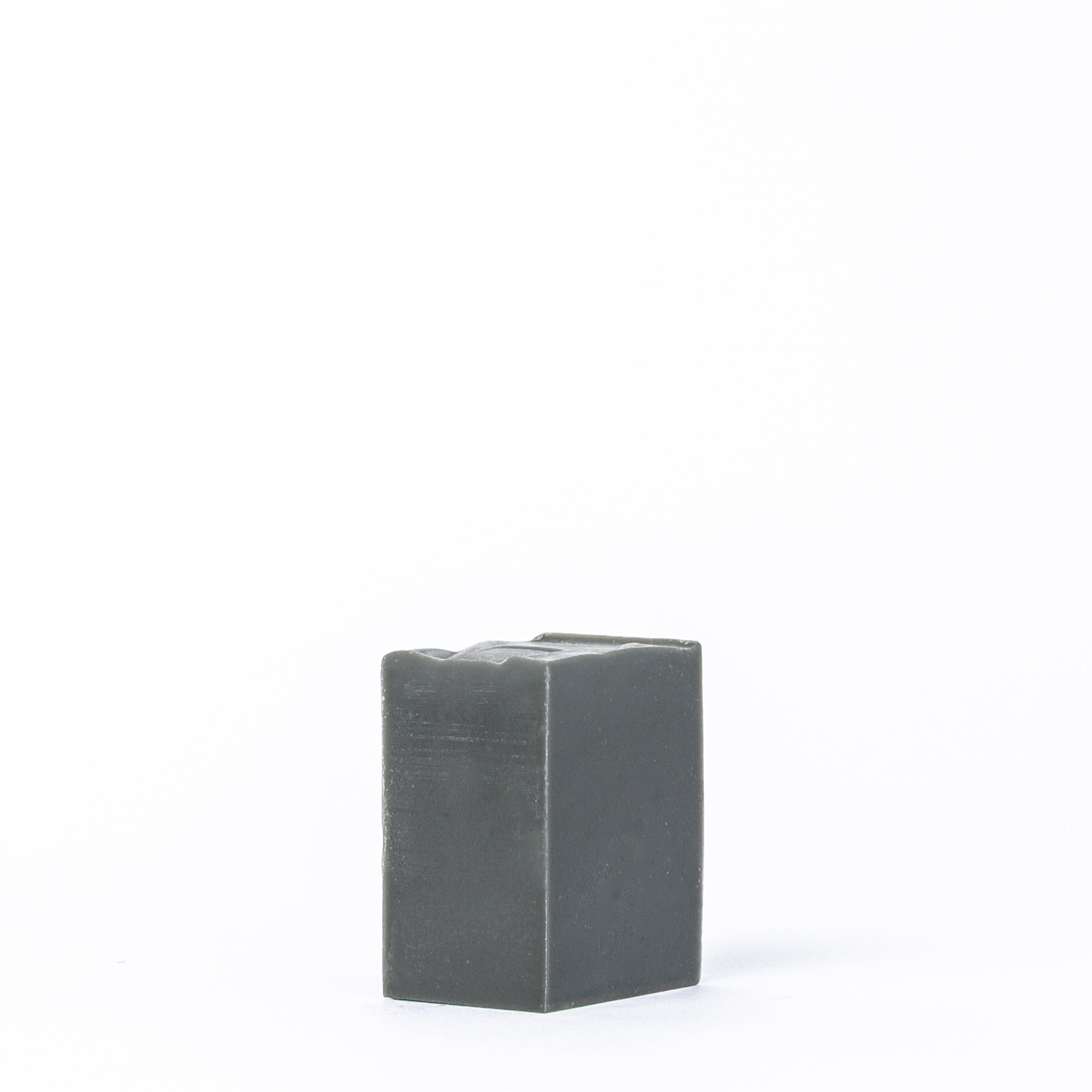 Osmia jojoba oil droplets on soap illustrate nourishing skin-softening benefits.