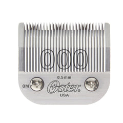 Oster detachable blade closeup shows 0.5 mm cut for precise fades.