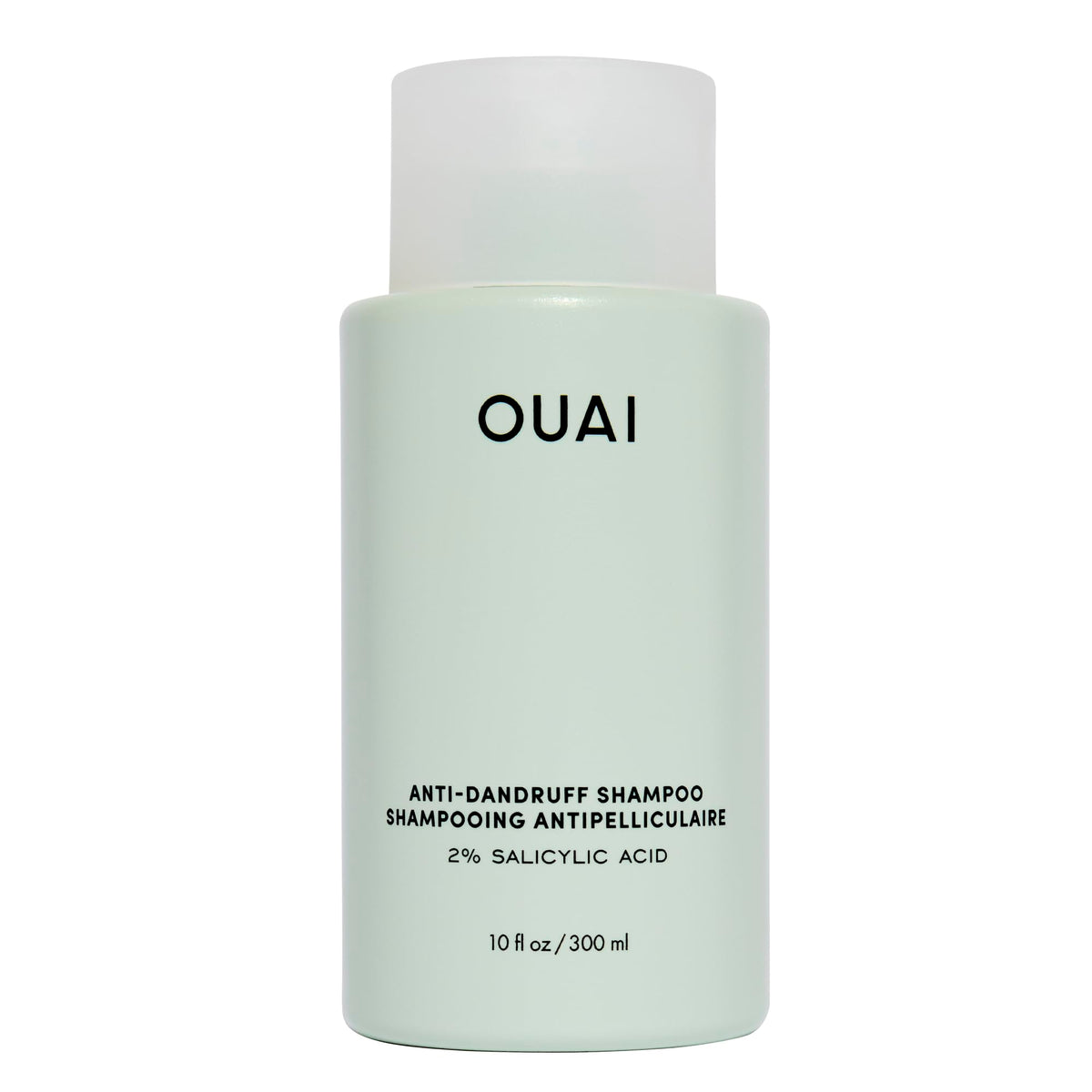 OUAI anti-dandruff shampoo bottle pour showing soothing scalp relief