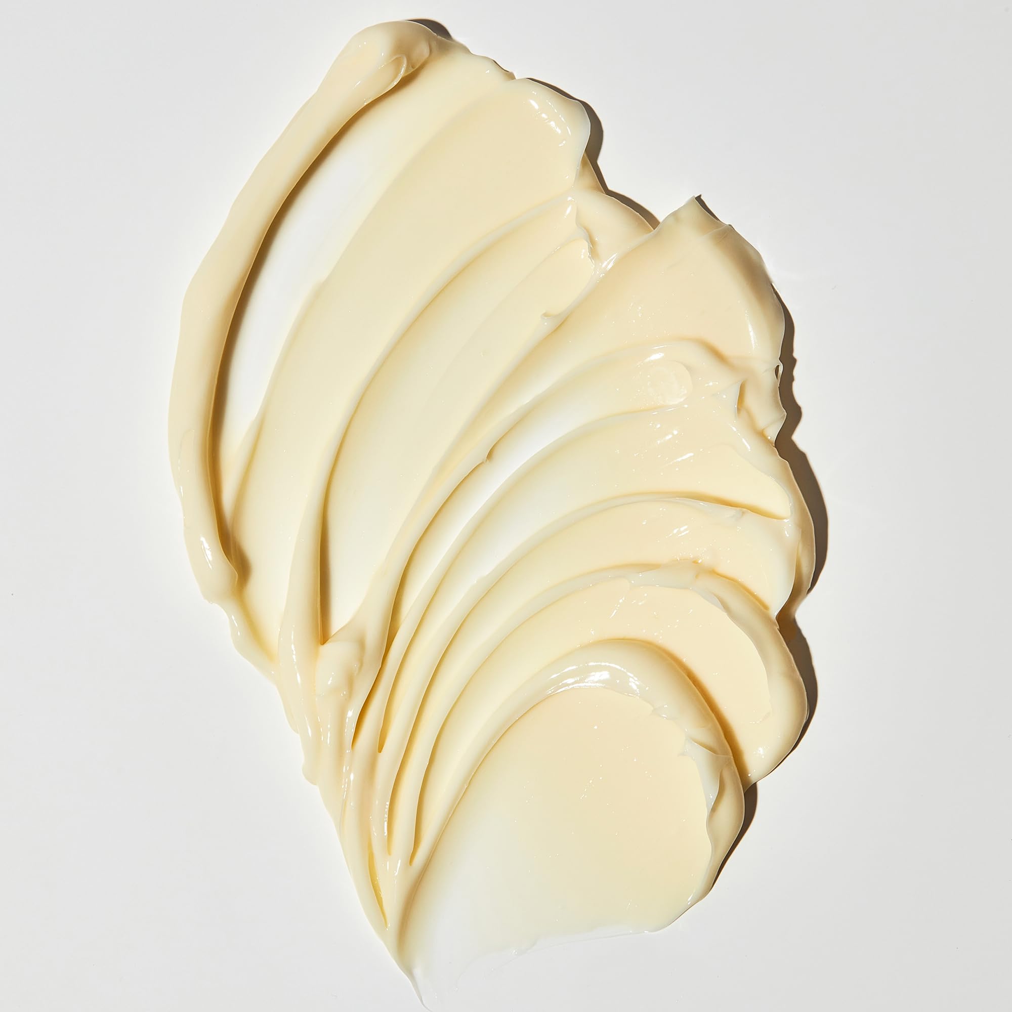 OUAI Body Creme glow-ready finish shows subtle radiance after application.
