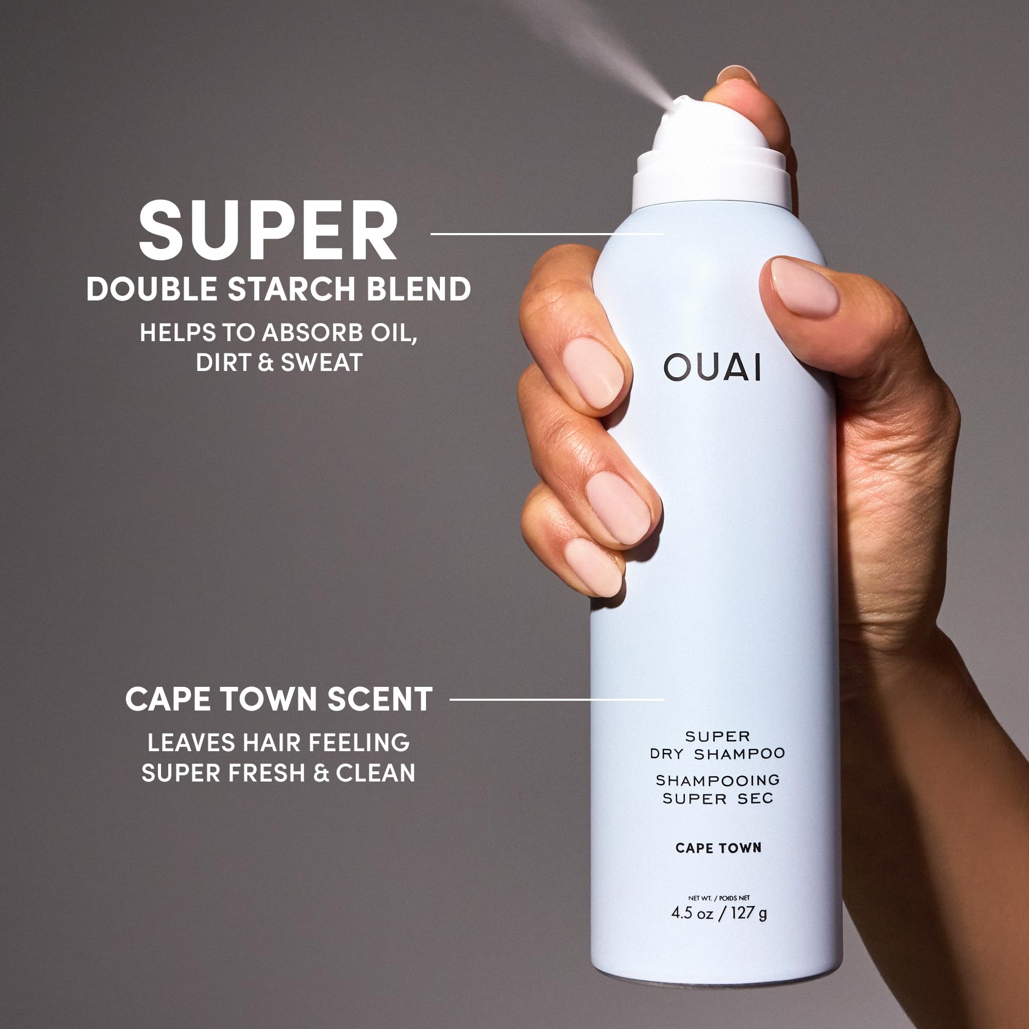 OUAI Capetown-capable bottle being held to illustrate portable freshness.