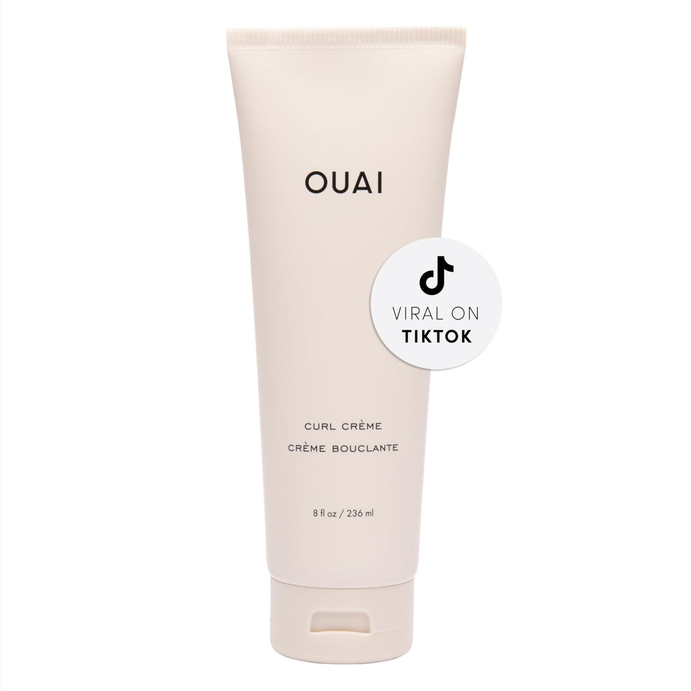 OUAI Curl Cream on wet hair showing defined, bouncy waves