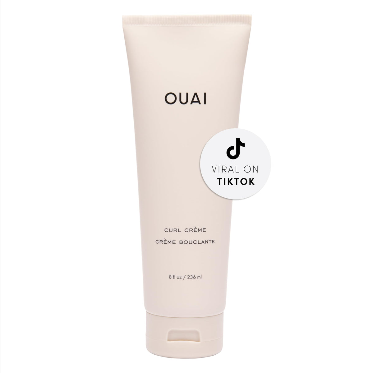 OUAI Curl Cream on wet hair showing defined, bouncy waves