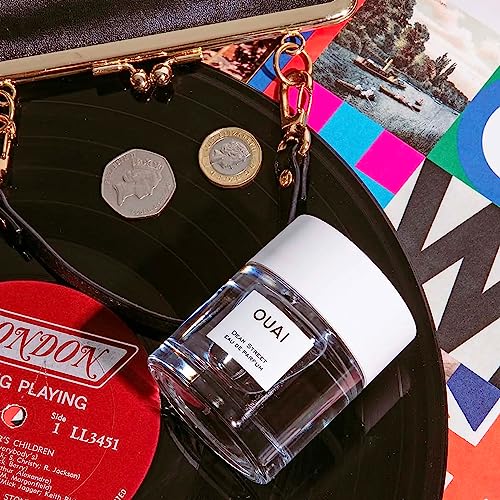 OUAI Dean Street glass bottle with mist demonstrates even application and lasting fragrance.