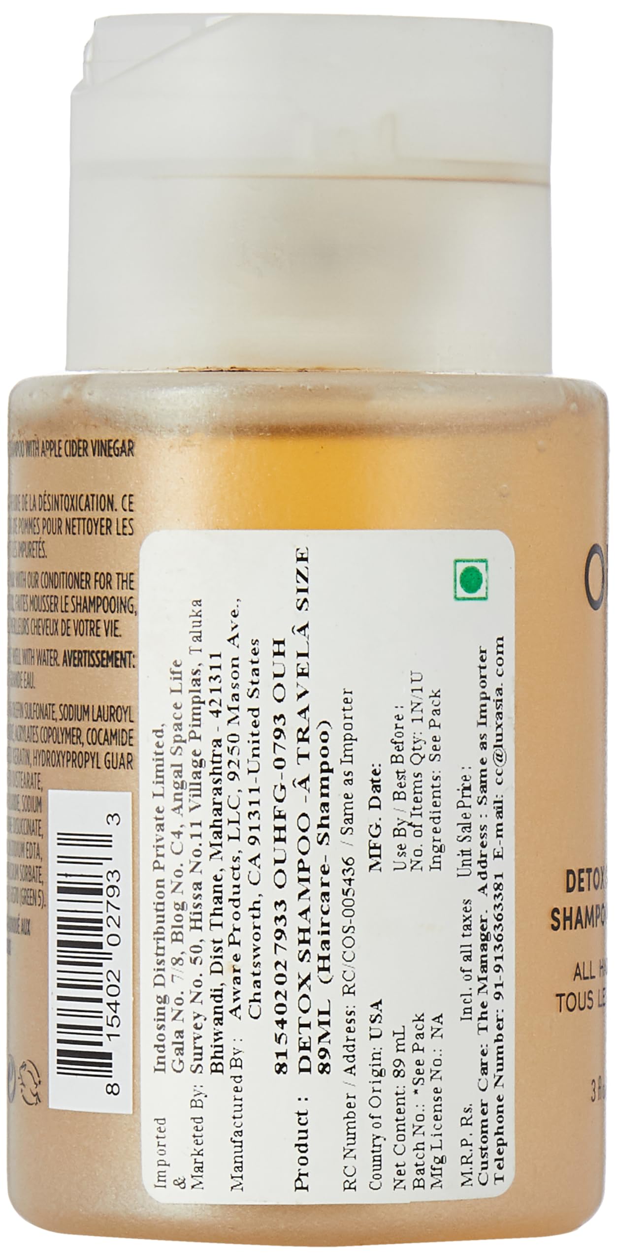 OUAI Detox Shampoo travel-size apple cider vinegar label highlights cleansing ingredients and detox potential