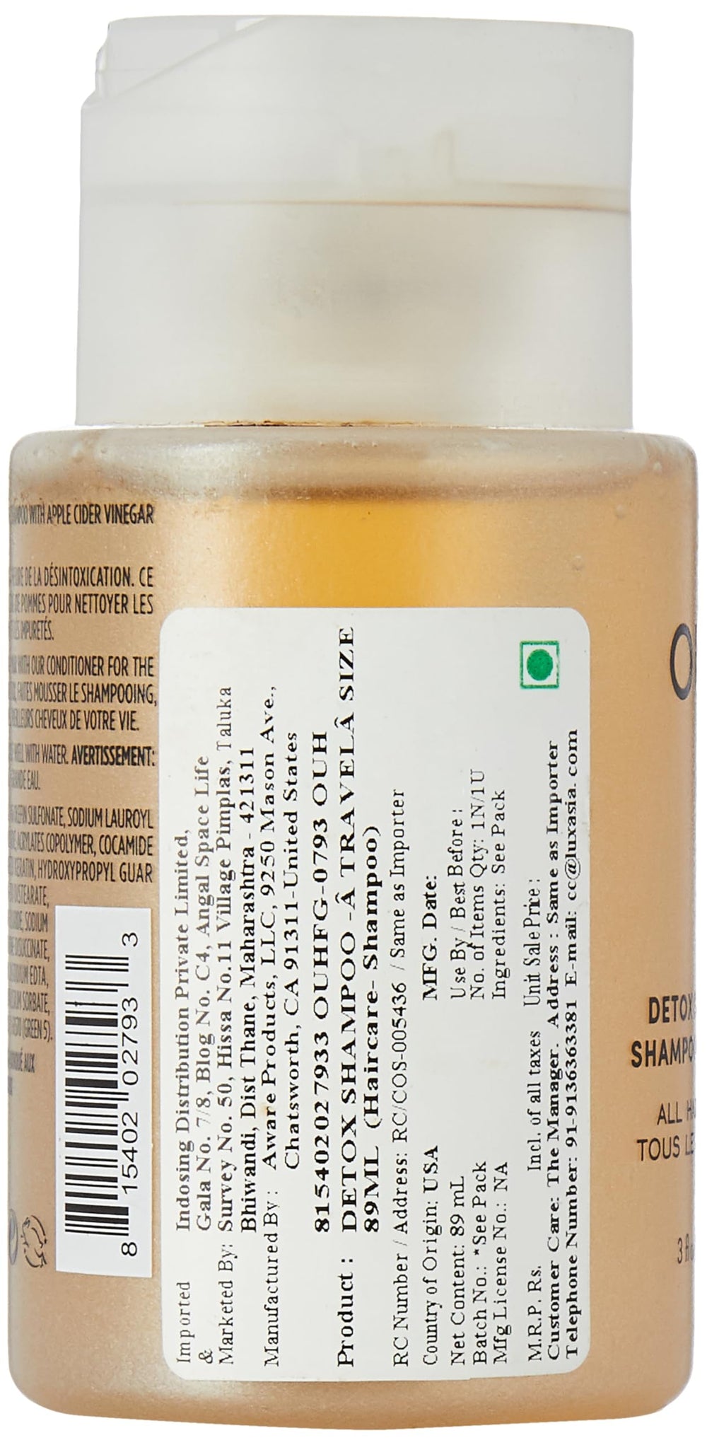 OUAI Detox Shampoo travel-size apple cider vinegar label highlights cleansing ingredients and detox potential