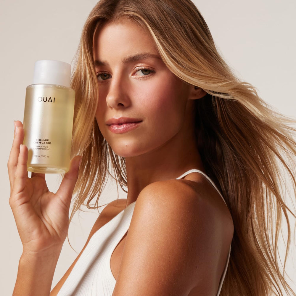 OUAI Fine Hair Shampoo Refill label close-up—biotin and keratin benefits.