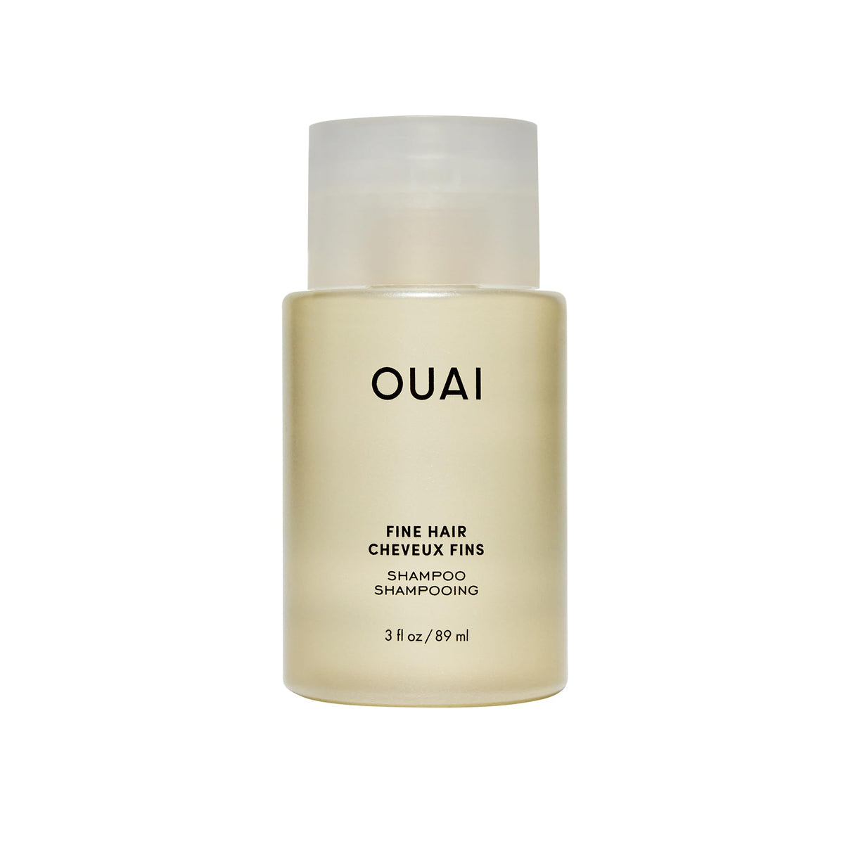 OUAI Fine Shampoo travel-size bottle shows color-safe volumizing cleanse.
