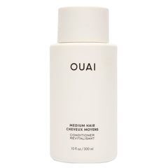 OUAI Medium Conditioner bottle emphasizes hydrating formula for daily hair care