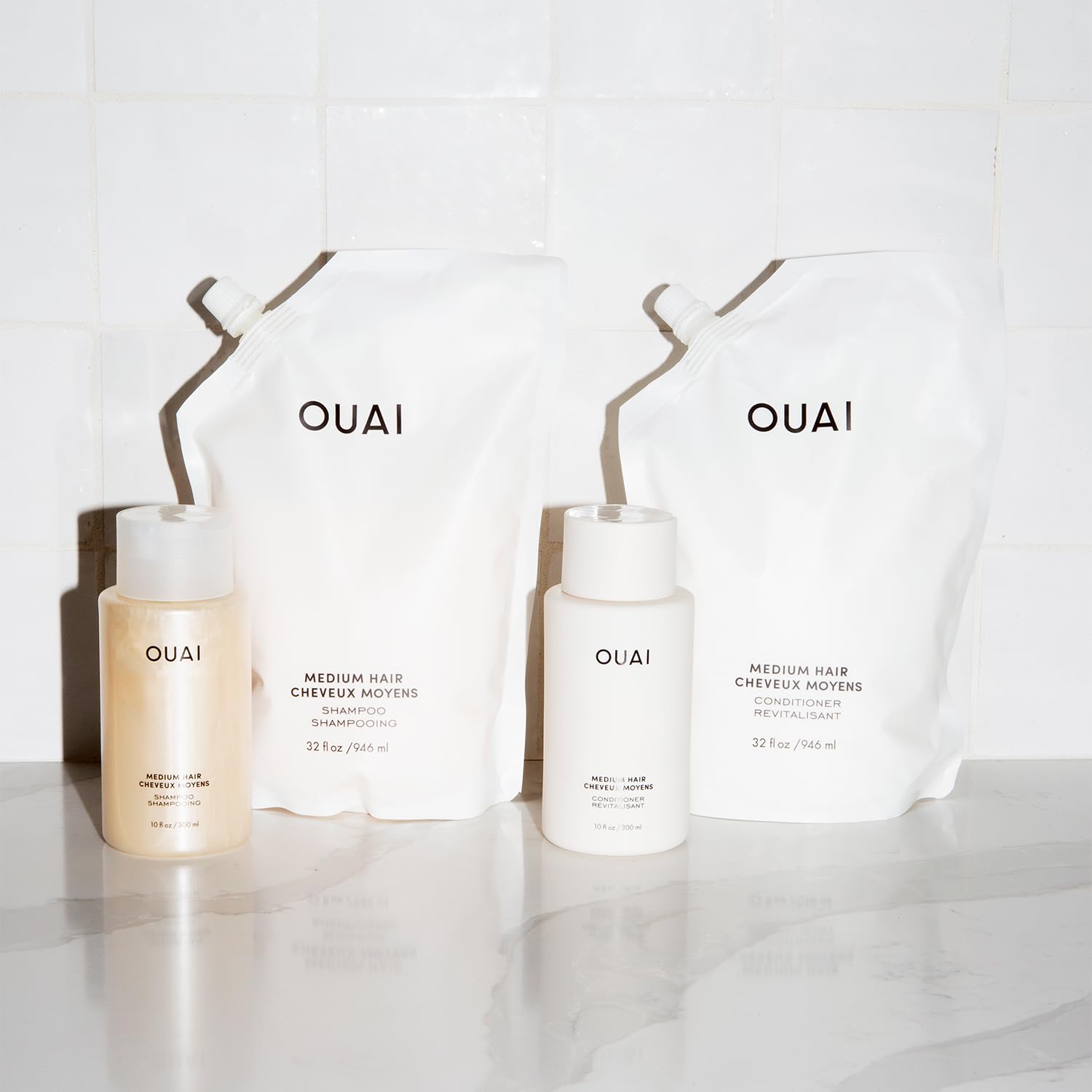 OUAI Medium Conditioner glossy finish suggests enhanced shine