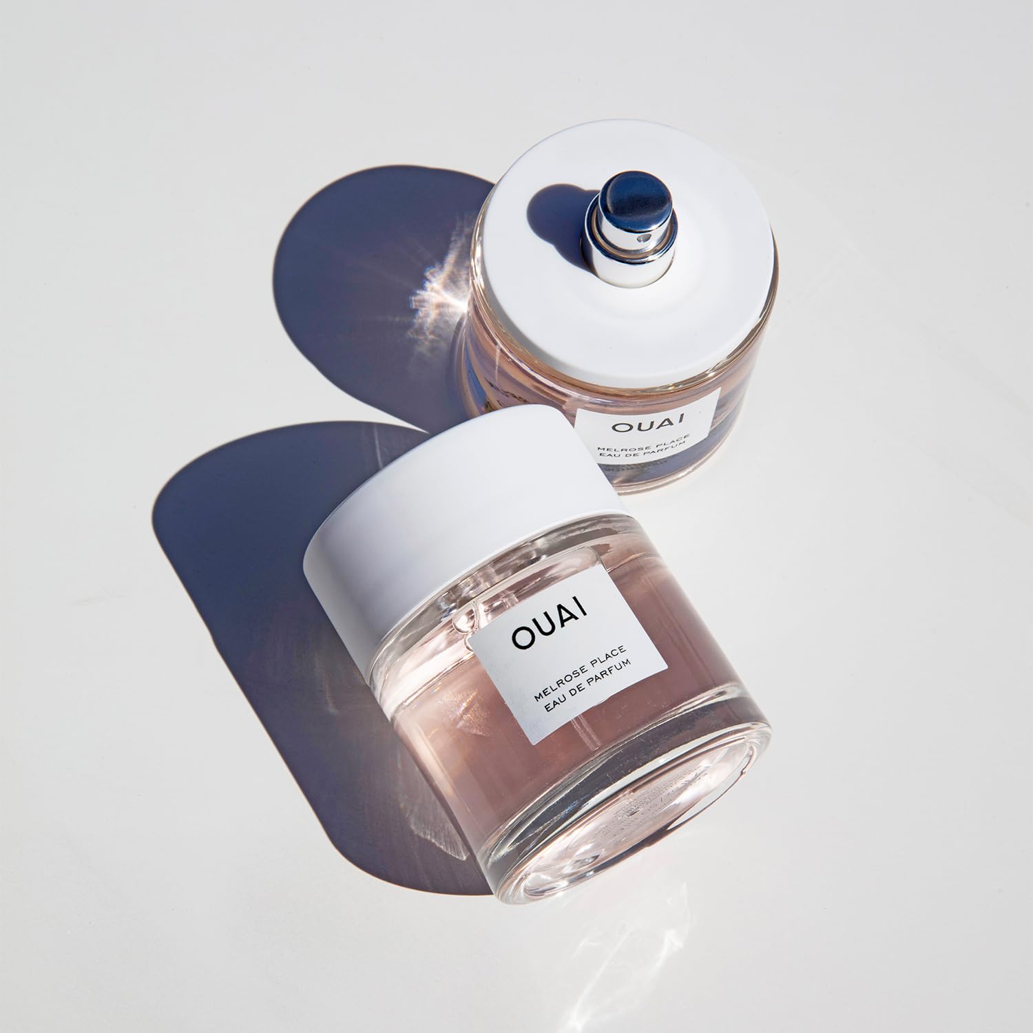 OUAI Melrose Place packaging and bottle design evokes Parisian elegance and effortless chic.