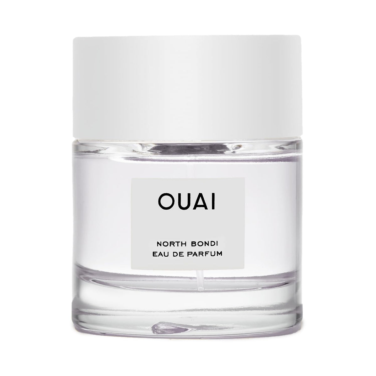 OUAI North Bondi eau de parfum bottle shines on a vanity with a fresh floral mood