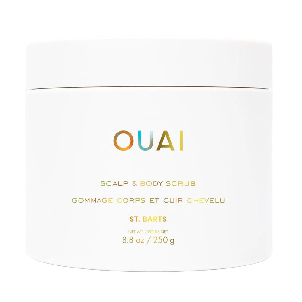 OUAI Scalp & Body Scrub bottle shows rich lather for gentle exfoliation on scalp and body.