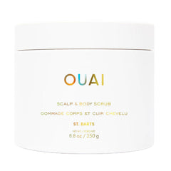 OUAI Scalp & Body Scrub bottle shows rich lather for gentle exfoliation on scalp and body.