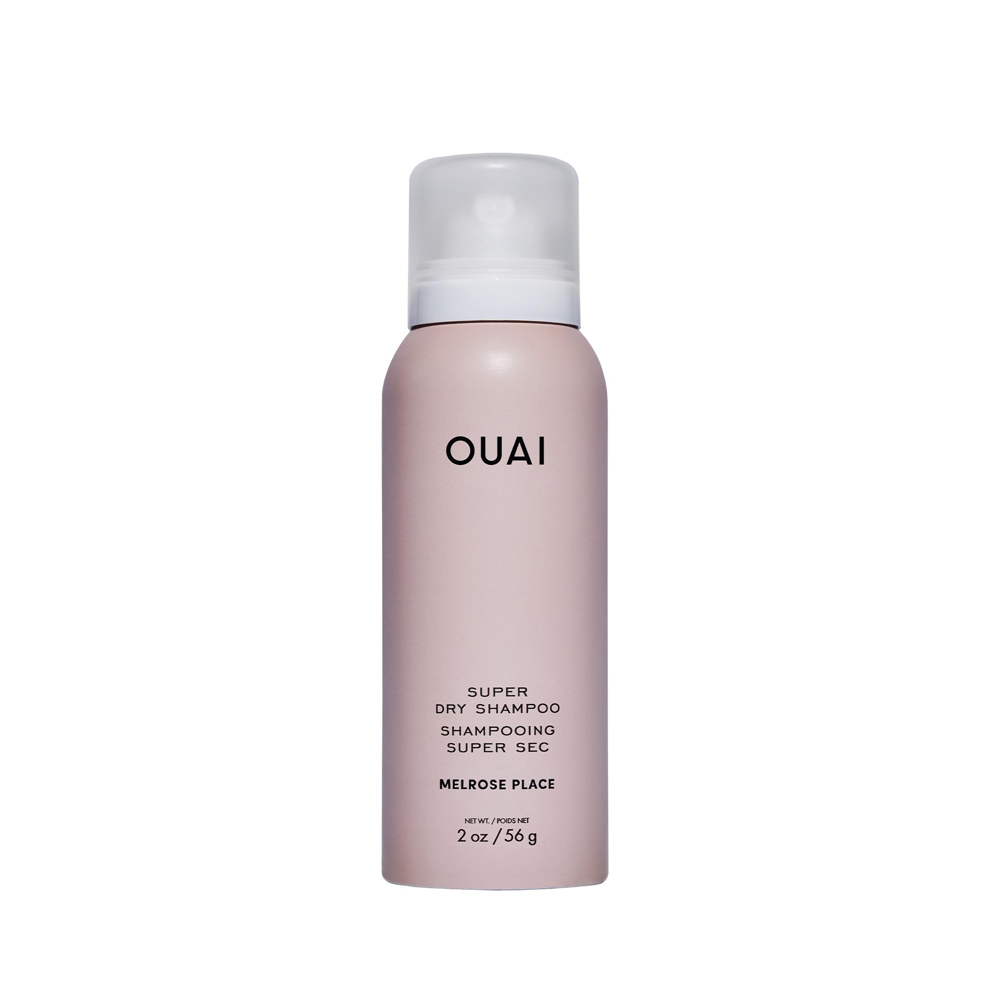 OUAI super travel dry shampoo bottle closeup for travel-ready refresh.