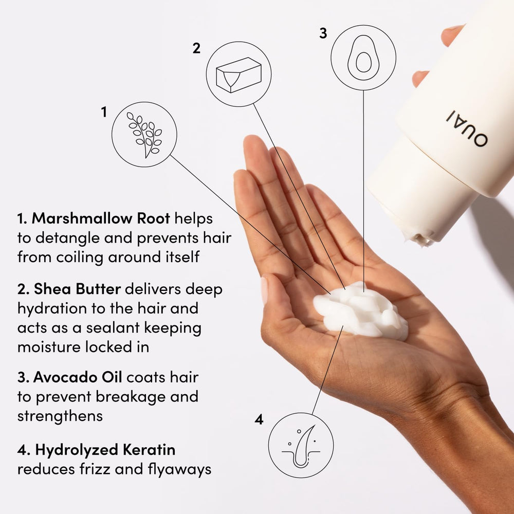 OUAI Thick Hair Conditioner being applied to mid-lengths for moisture.