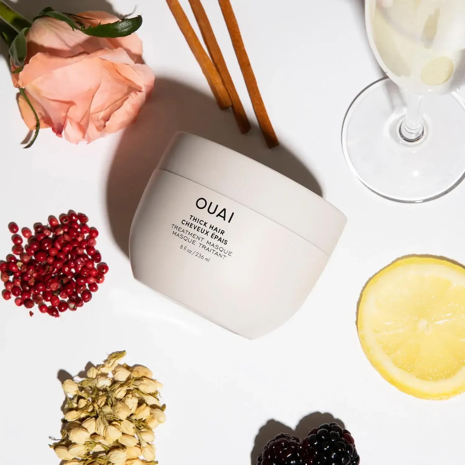 OUAI Thick Hair Mask jar packaging in a premium container