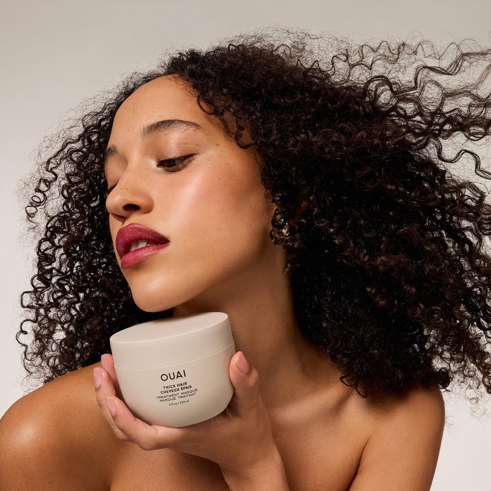 Damp hair after washing with OUAI Thick Hair Mask ready to absorb