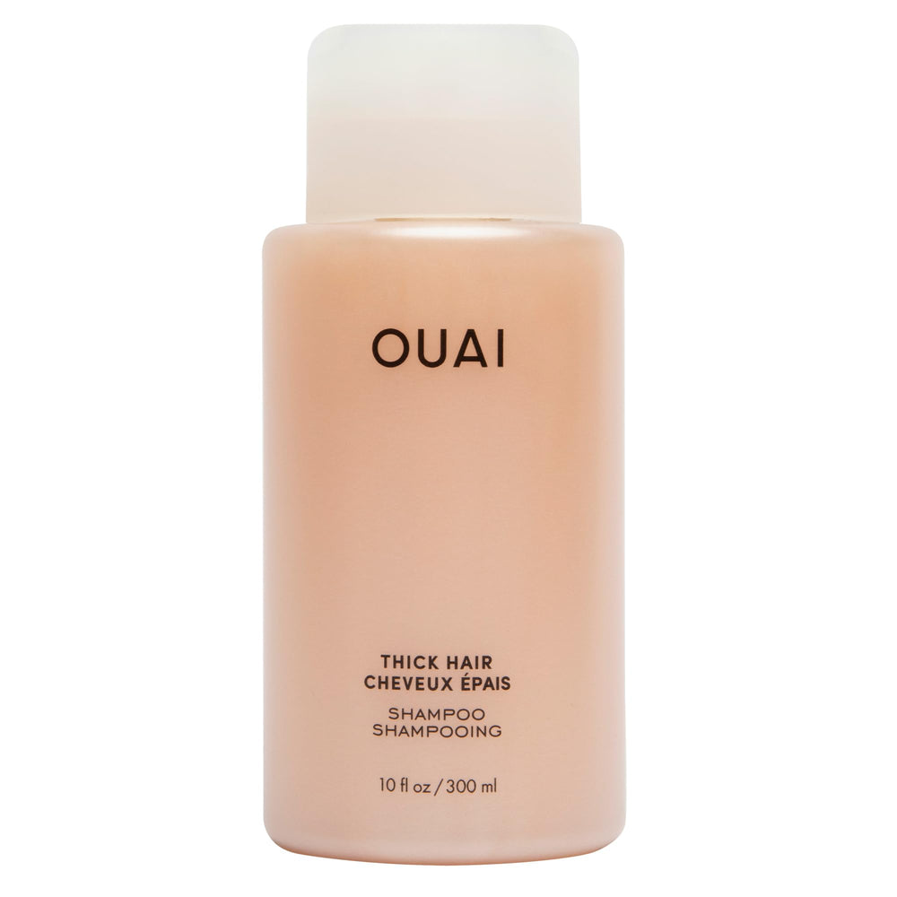 OUAI Thick Shampoo bottle closeup shows rich hydration for thick hair.