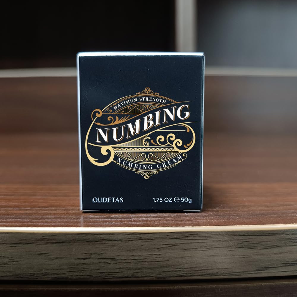 Oudetas Numbing Cream 50ml bottle sits on a vanity, highlighting travel-friendly size.