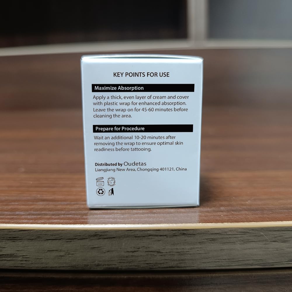 Oudetas Numbing Cream in travel pouch ready for on-the-go comfort.