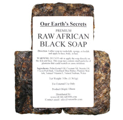 Our Earth's Secrets raw African black soap texture closeup shows natural particles for gentle exfoliation.