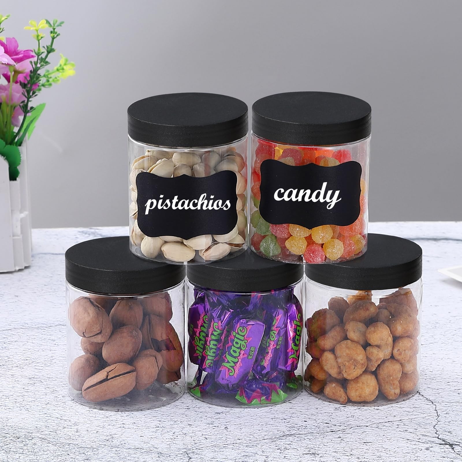 OUSHINAN jars with black lids used for body cream and lotion storage.