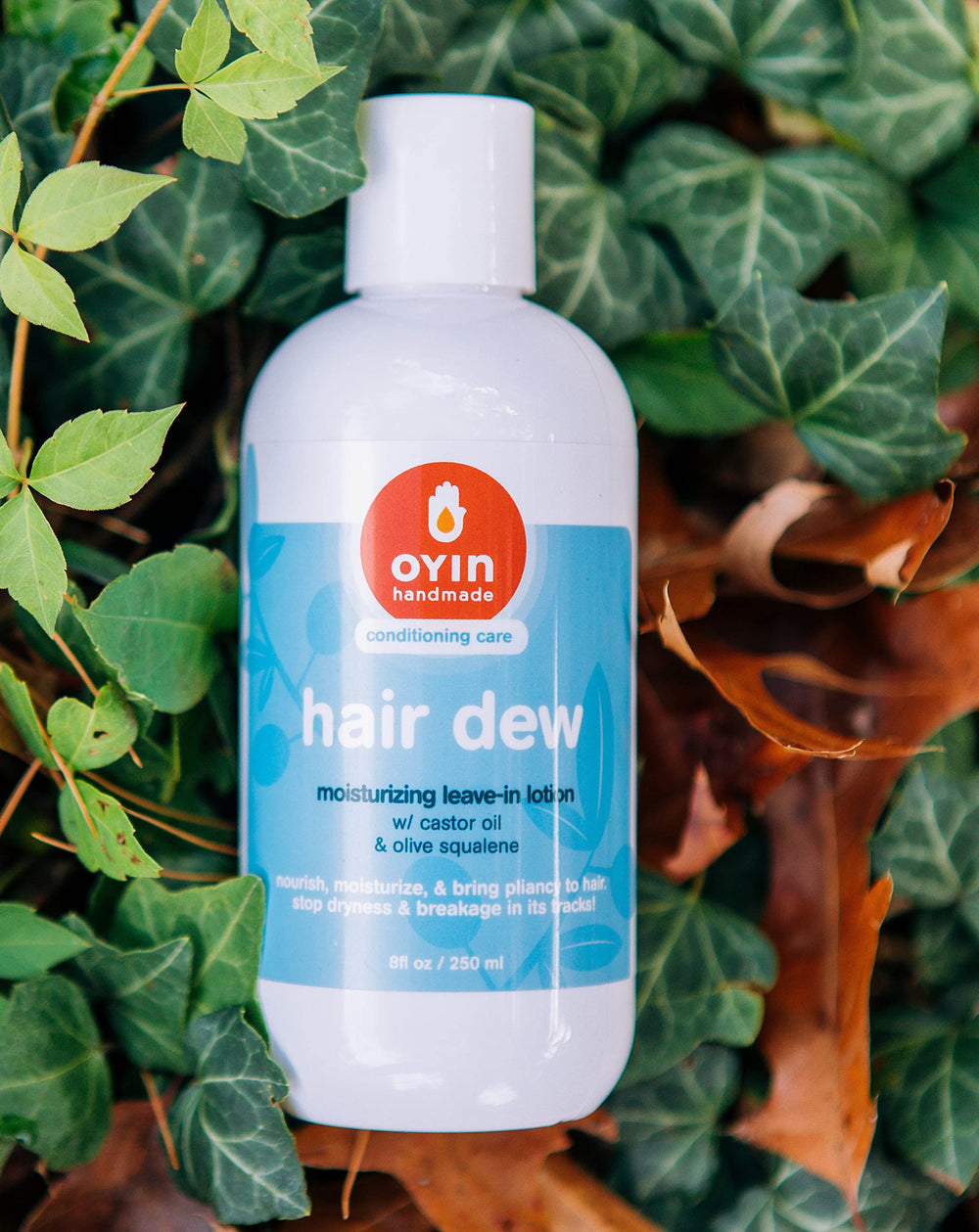 Oyin Hair Dew cream texture closeup highlights creamy consistency for easy smooth styling