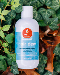 Oyin Hair Dew cream texture closeup highlights creamy consistency for easy smooth styling