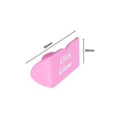 OYS GLOW sunbed lip cover shows travel-friendly design for on-the-go tanning routines.