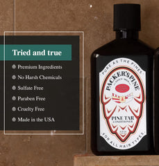 Packer's Pine Tar Conditioner hand-apply shot highlights smooth, manageable hair.