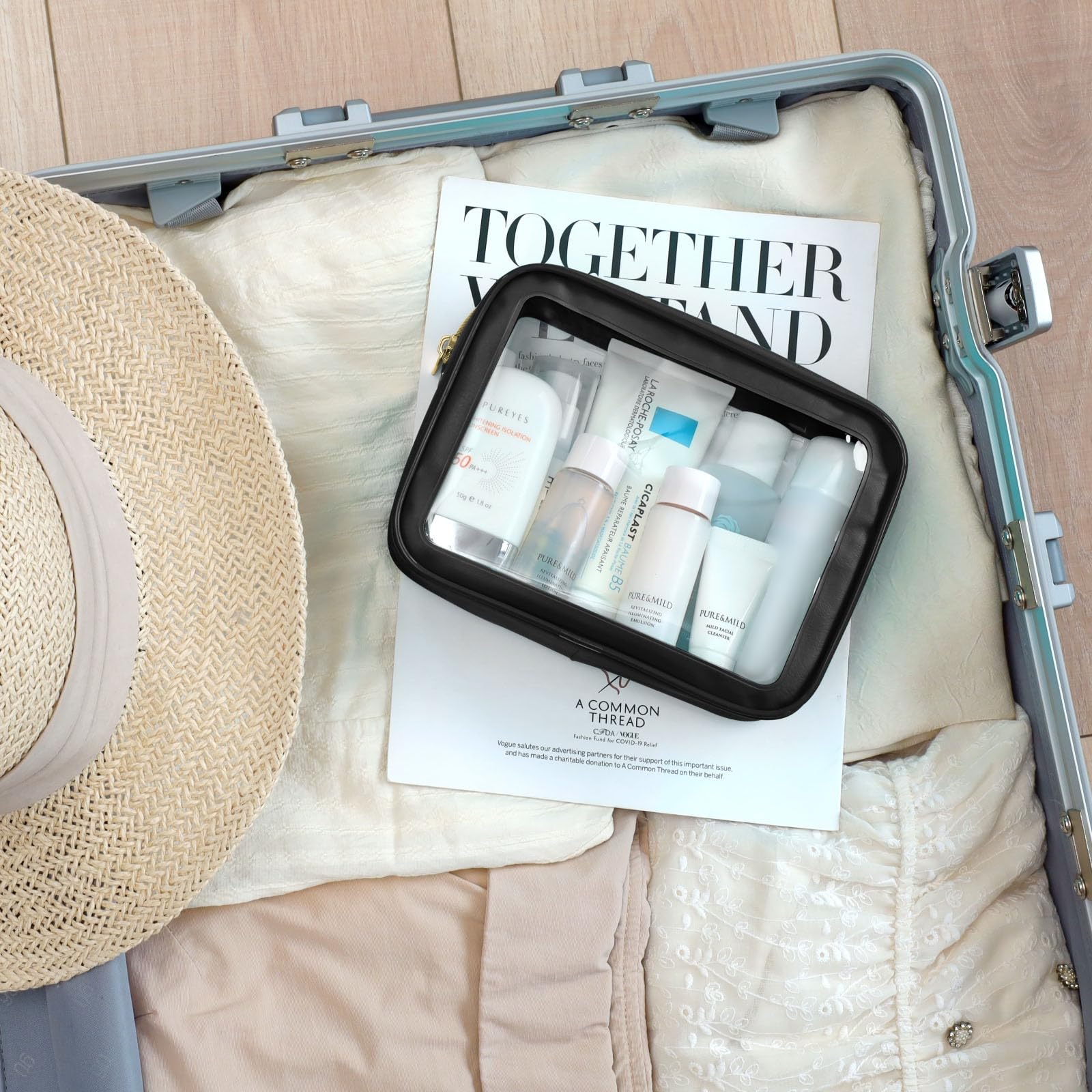 PACKISM Clear Makeup Bag 3 Medium deodorizing pouch visible for odor control.