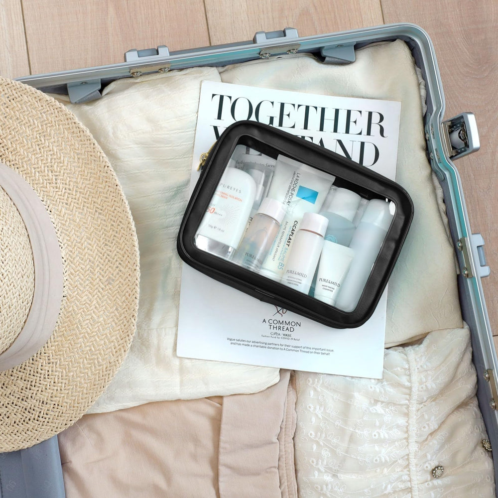 PACKISM Clear Makeup Bag 3 Medium deodorizing pouch visible for odor control.